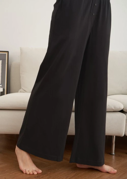 下身_秋日晴空．純棉寬鬆口袋縫釦長褲（黑色）