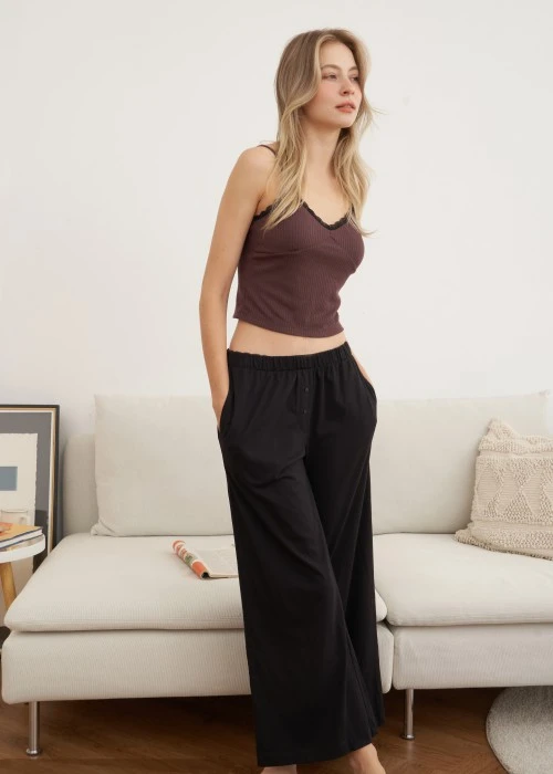 下身_秋日晴空．純棉寬鬆口袋縫釦長褲(黑色)